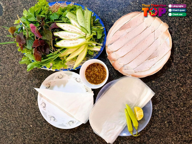 Nha-hang-com-nieu-ca-bong-huetoplist