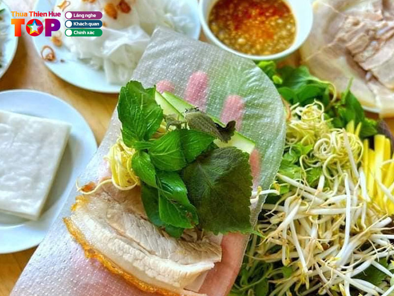 Quan-nhim-banh-trang-cuon-thit-heo-a-luoi-huetoplist